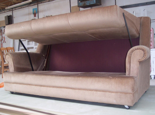 Illustration for article titled This Couch Turns Into a Snooker Table